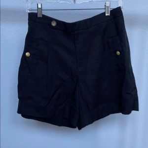 Anthropologie black shorts with side gold zipper